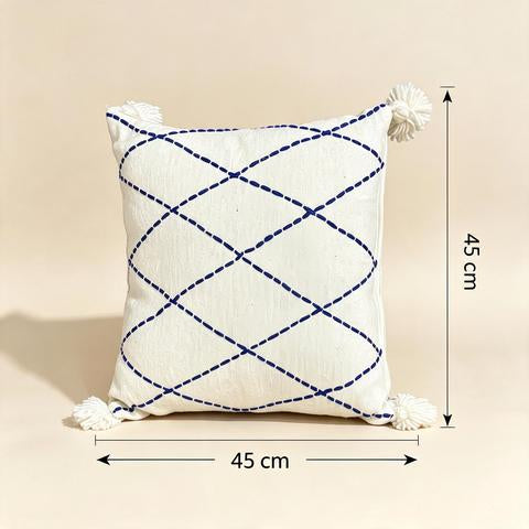 Coussin décoratif écru à motif losanges bleu roi