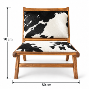 Fauteuil lounge « Pampa » en teck et peau de vache noir et blanc – Design bas
