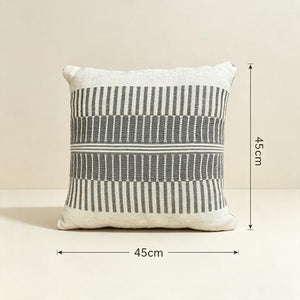 Coussin décoratif écru à motifs géométriques anthracite