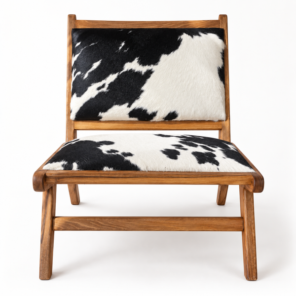 Fauteuil lounge « Pampa » en teck et peau de vache noir et blanc – Design bas
