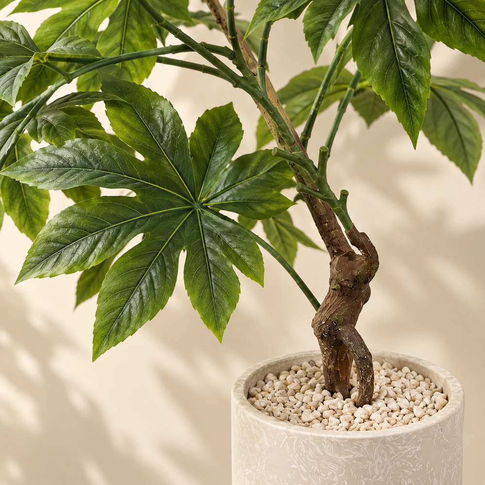 Plante artificielle Fatsia Japonica en pot cylindrique