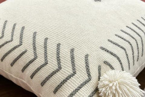 Coussin rectangulaire écru brodé à motifs géométriques
